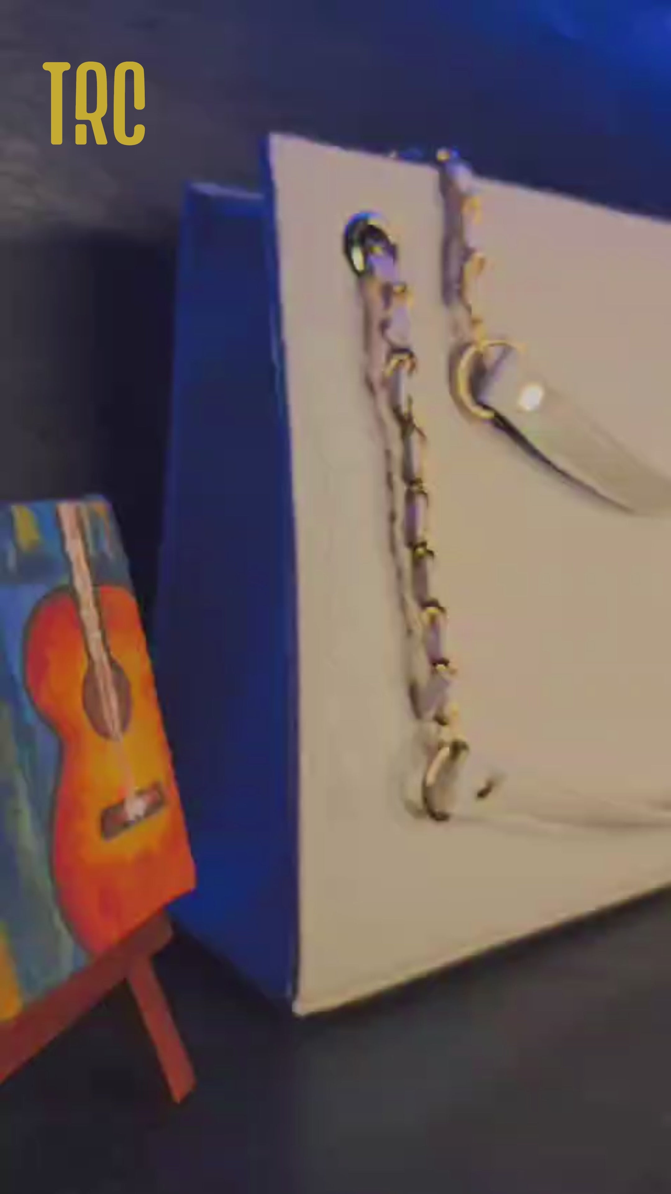A video showcasing the croc-textured white box handbag